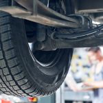 Car on a lift in mechanic shop